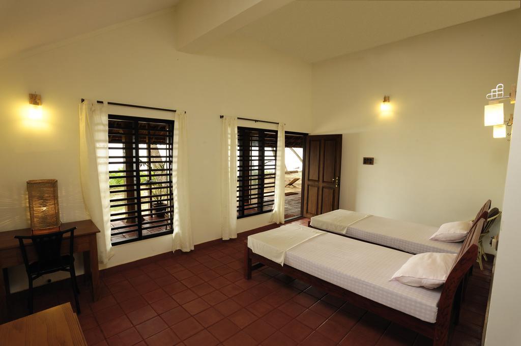Hôtel Chera Rocks Beach House à Thottada Chambre photo
